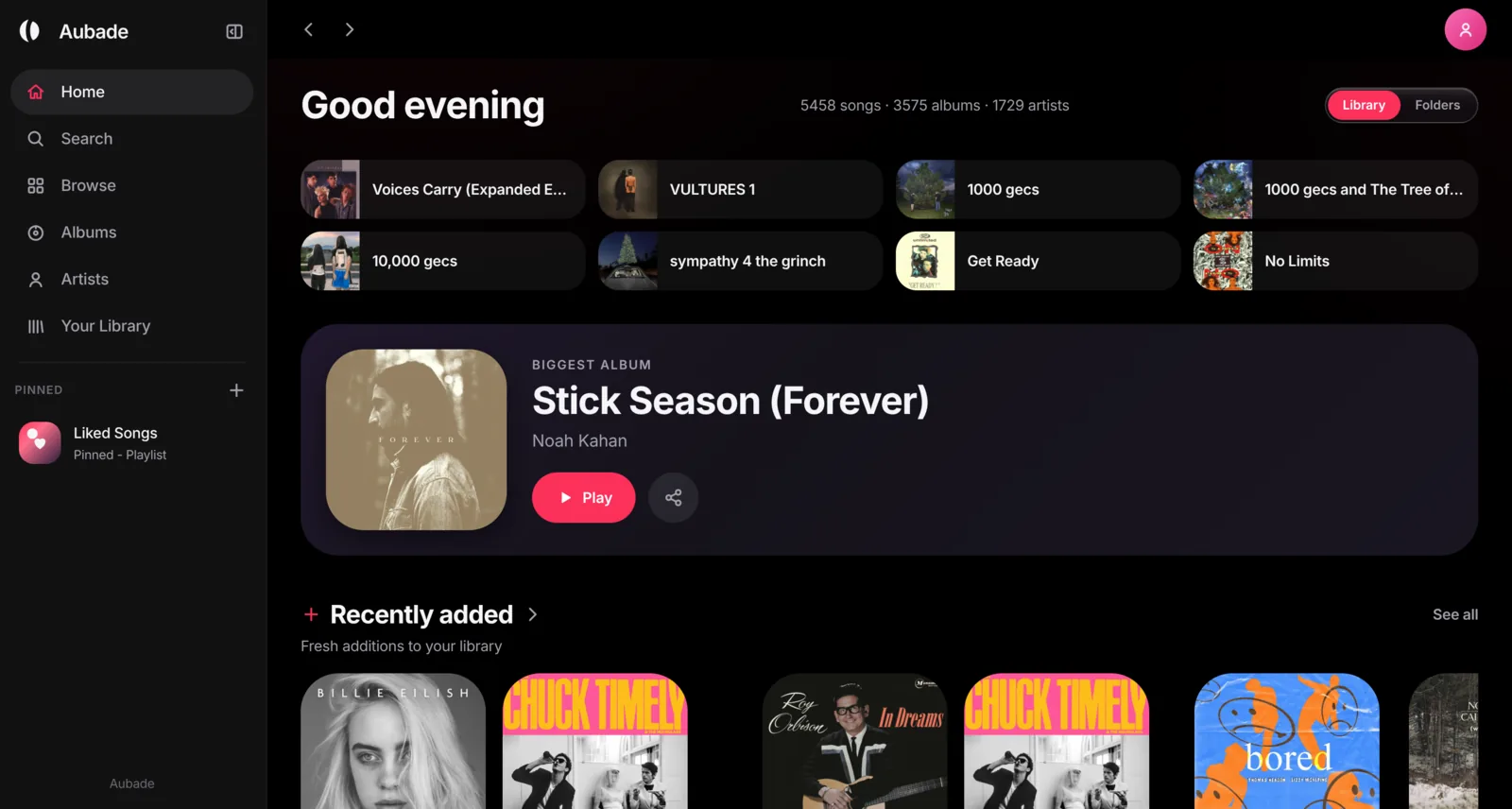 Aubade on a desktop: a sidebar of albums and artists beside a home page of quick links, a featured album and a shelf of recent additions.